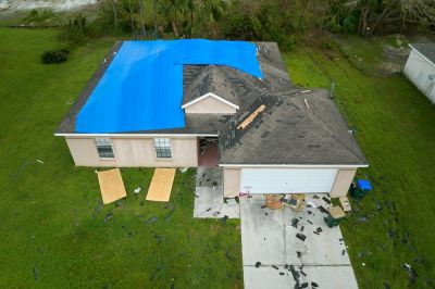 Reduce Repair Cost with Roof Tarping!